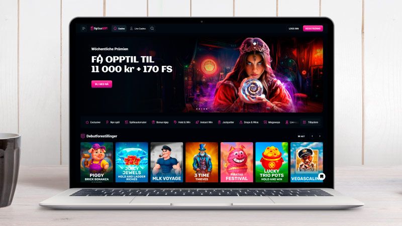 Hovedsiden til SpinsUP Casino på skjermen til bærbar datamaskin